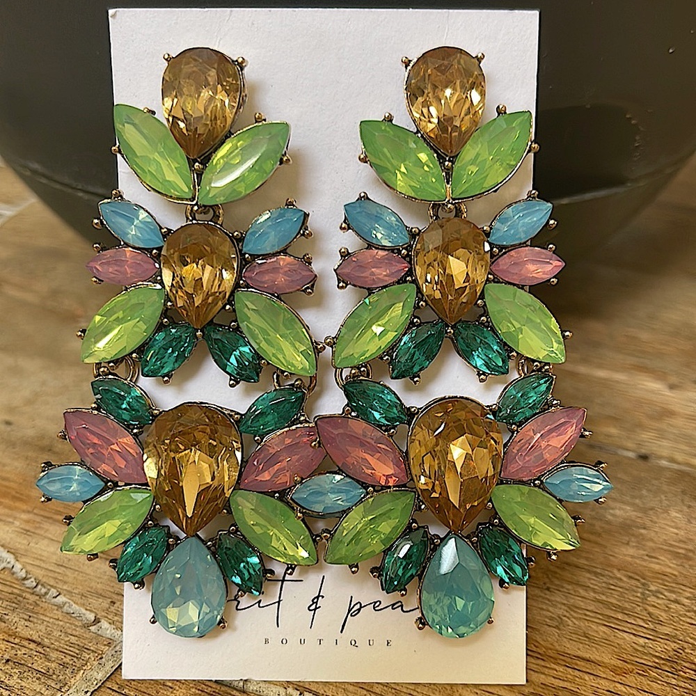 Statement piece with gorgeous colors of gold green blue and pink